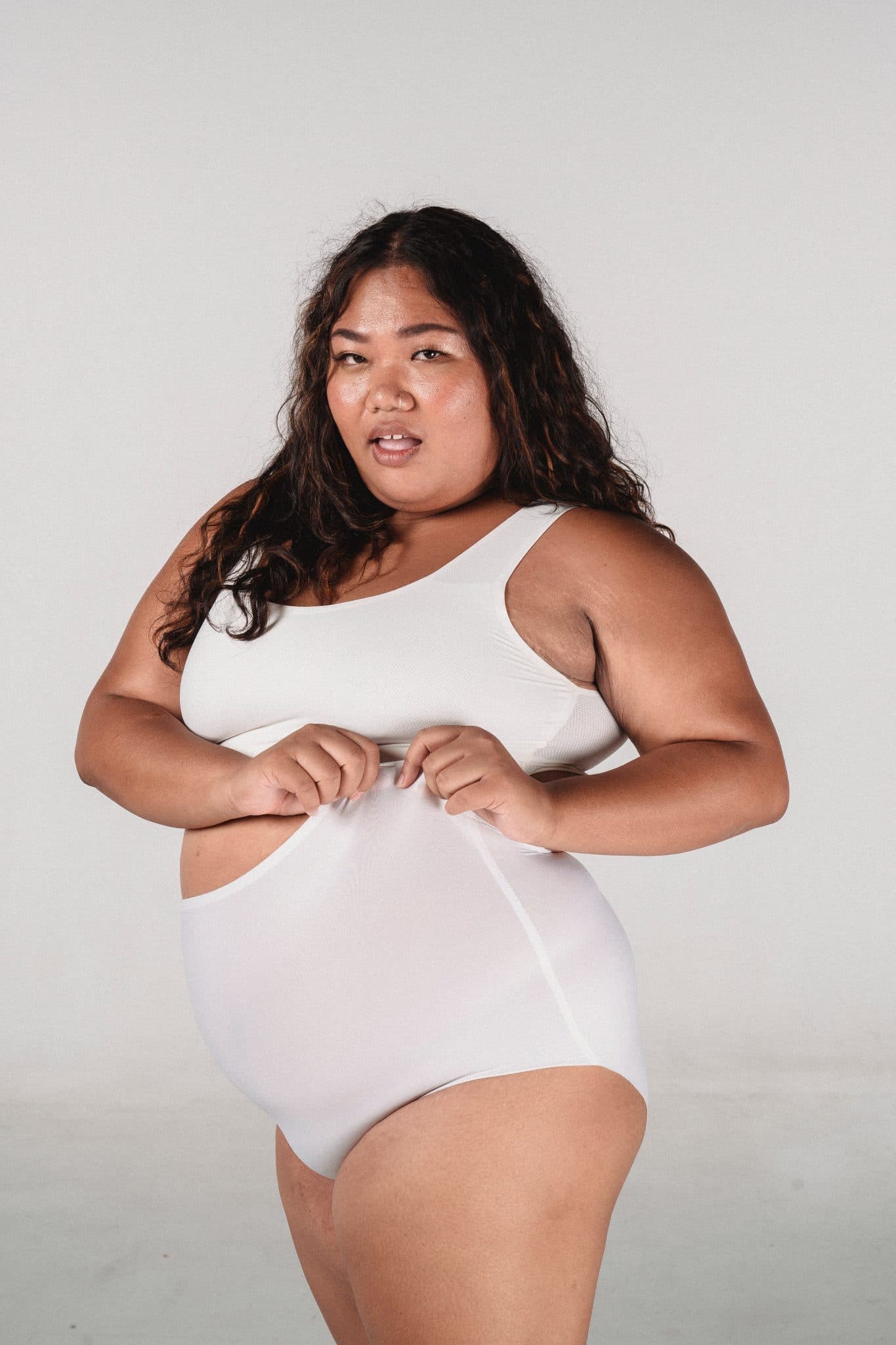 Same style different size. The full body tummy control comes in sizes