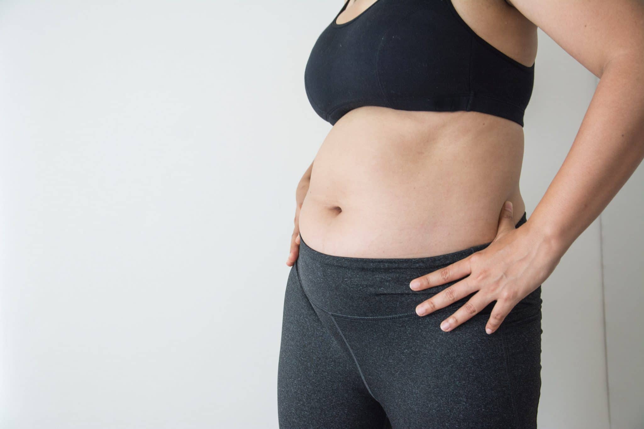 How To Make Your Stomach Look Flat in Clothes