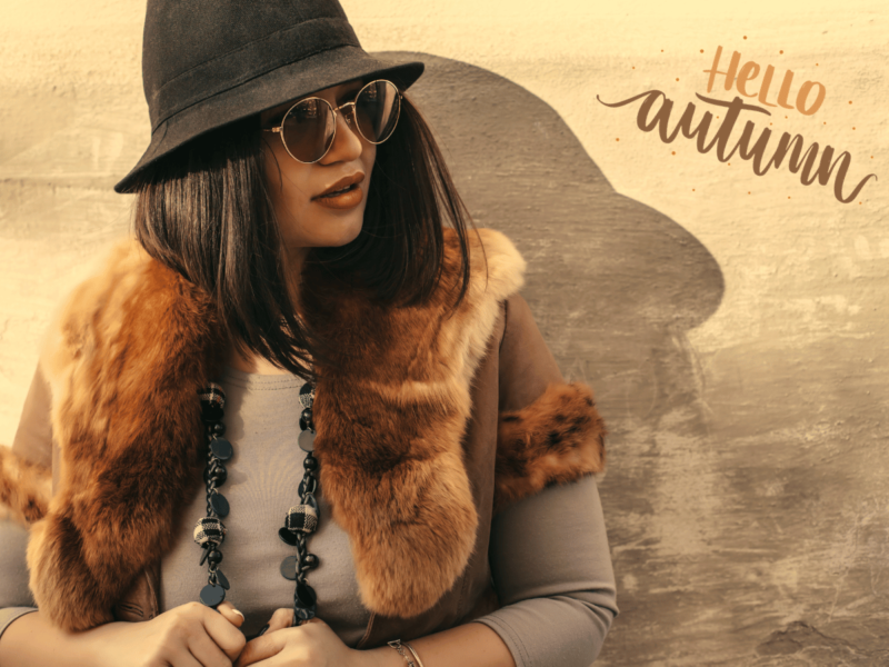 A woman is dressed in layered clothes in autumn style. Overlaid text reads "hello autumn".
